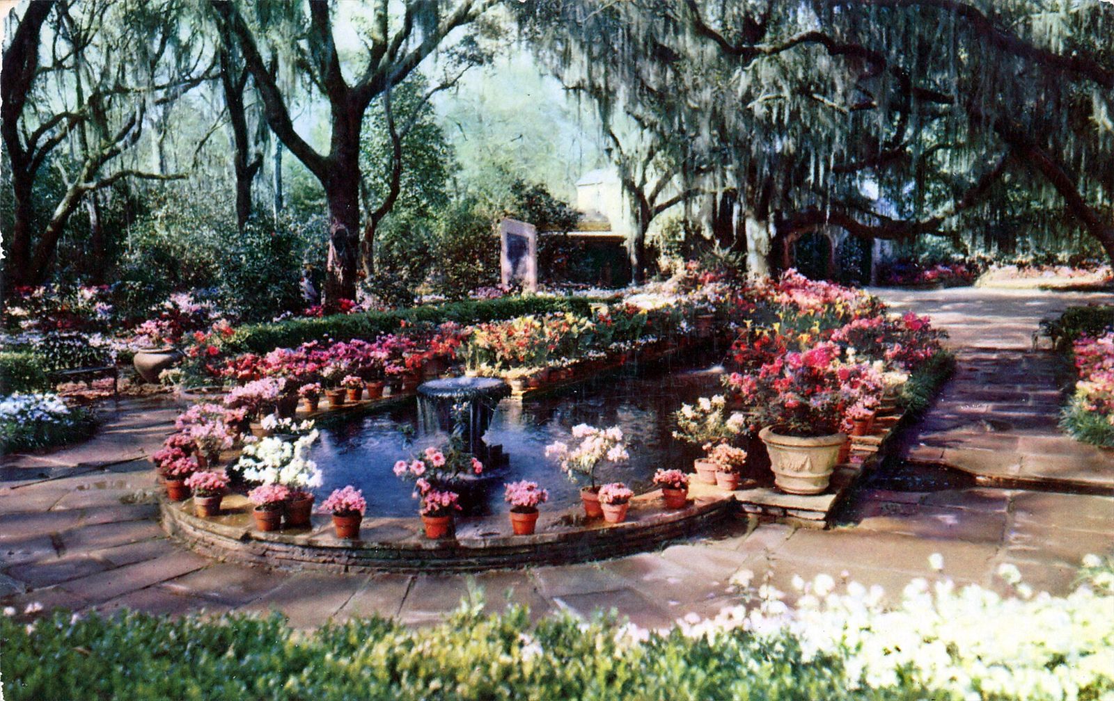 The pool and fountain among flowering gardens at Bellingrath Gardens near Mobile