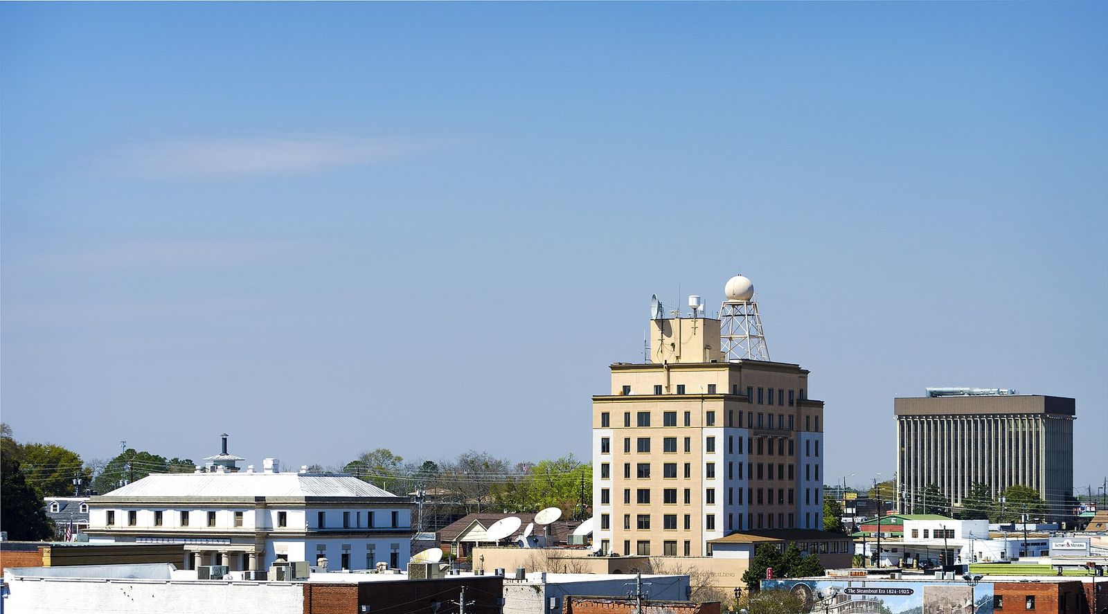 Buildings of downtown Dothan, Alabama, under a clear sky