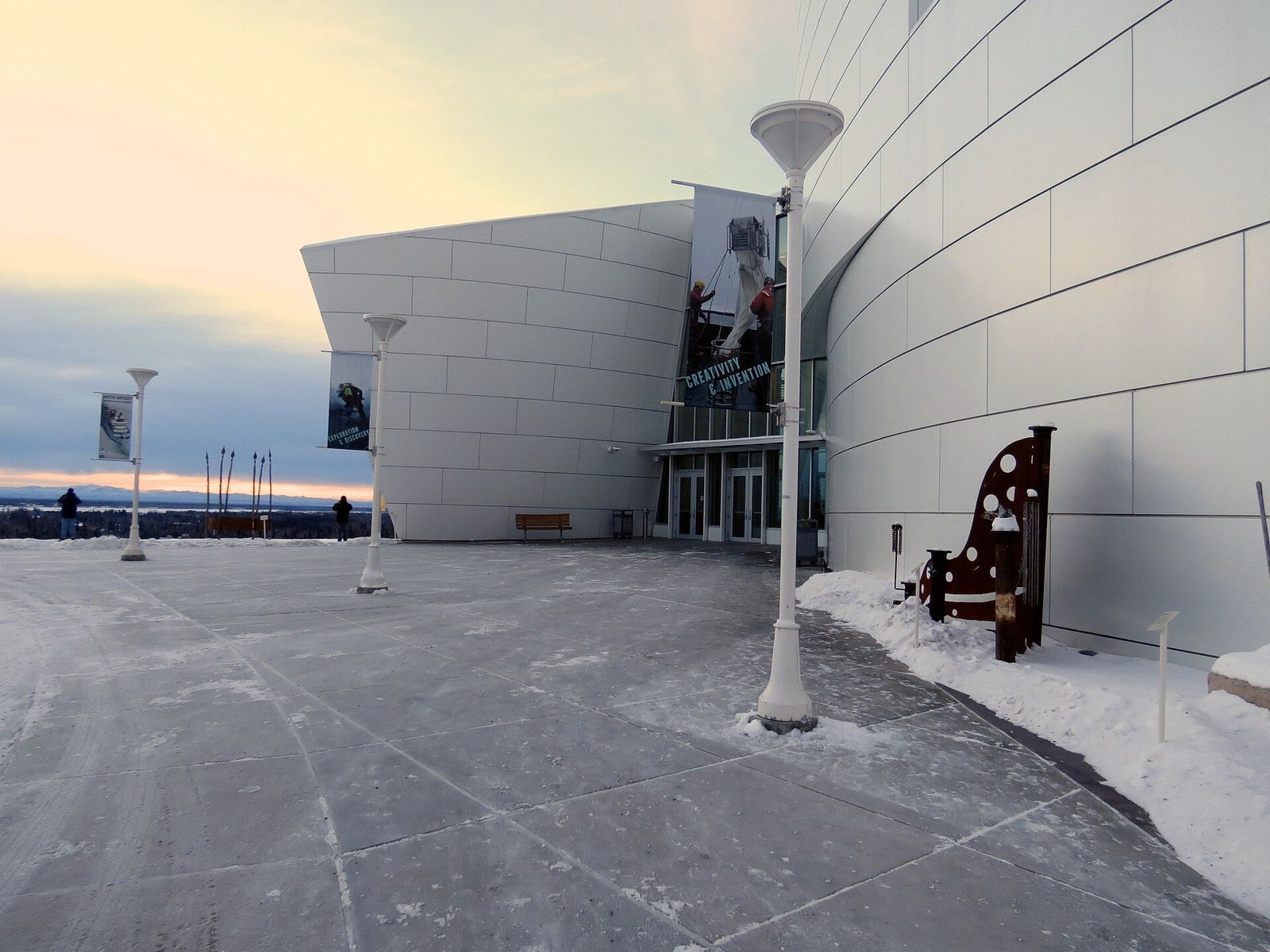 The curved white front of the University of Alaska Museum of the North on the UAF campus in Fairbanks