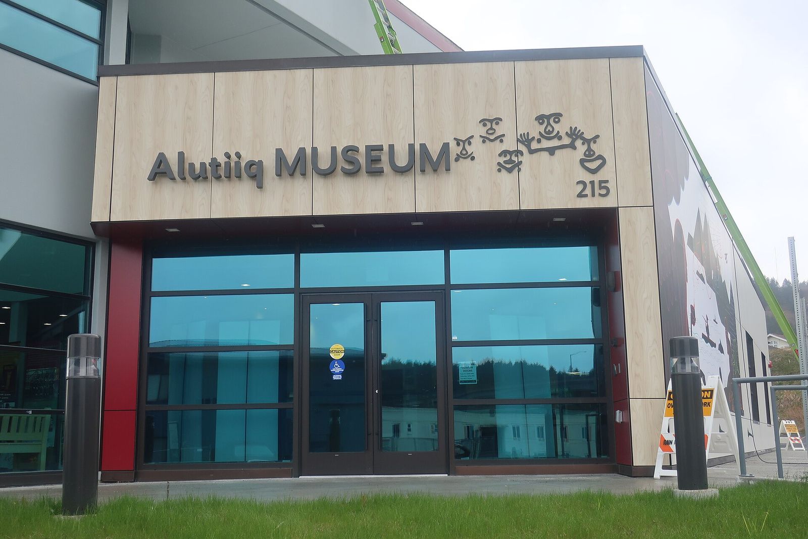 The front of the Alutiiq Museum in Kodiak, with its name above glass doors