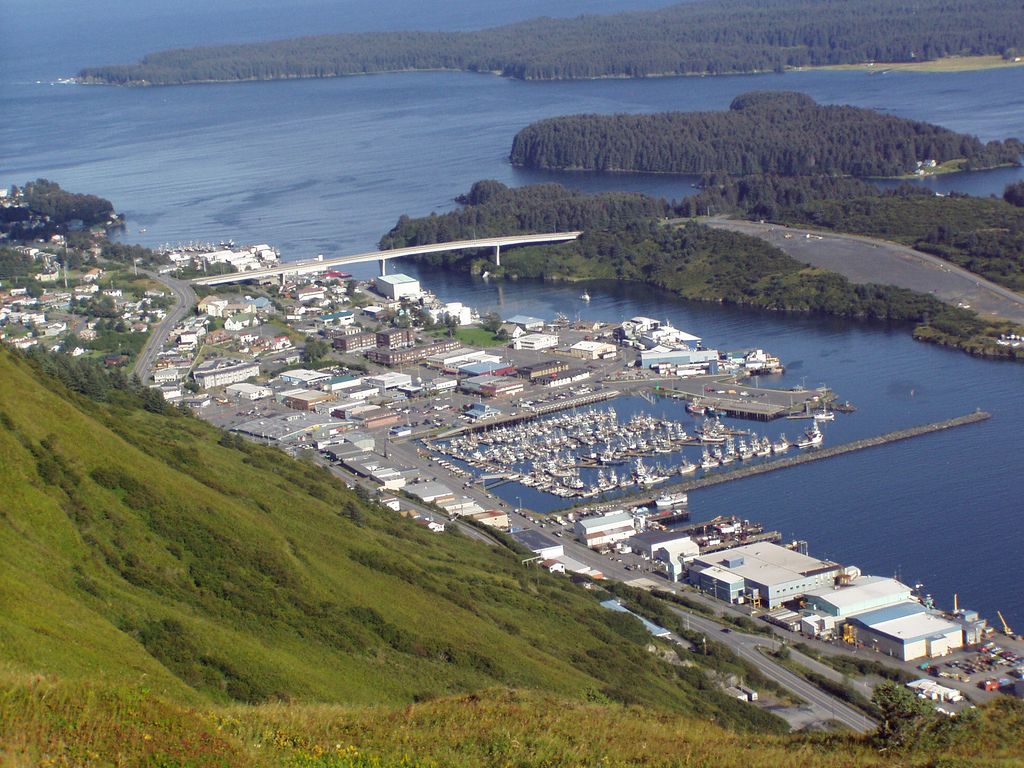 The harbor, bridge and town of Kodiak seen from Pillar Mountain, with green islands beyond