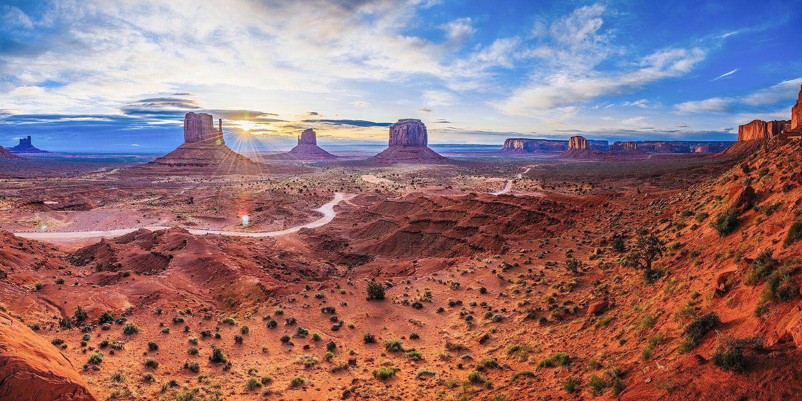 Sunrise over the sandstone buttes of Monument Valley on the Arizona and Utah border