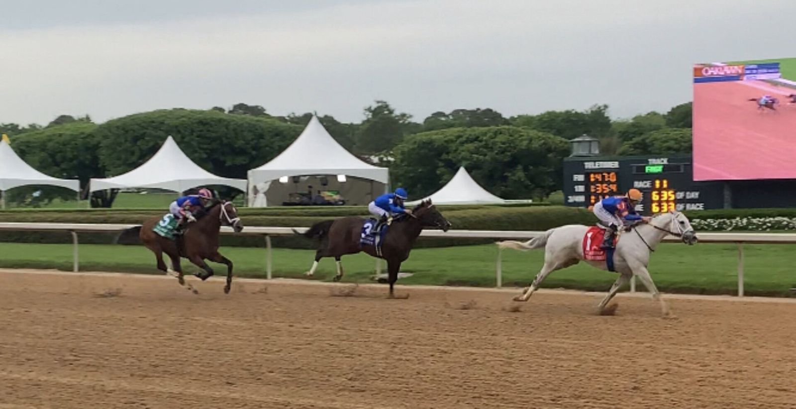 Horses racing down the stretch in the 2026 Oaklawn Handicap at Oaklawn Park in Hot Springs