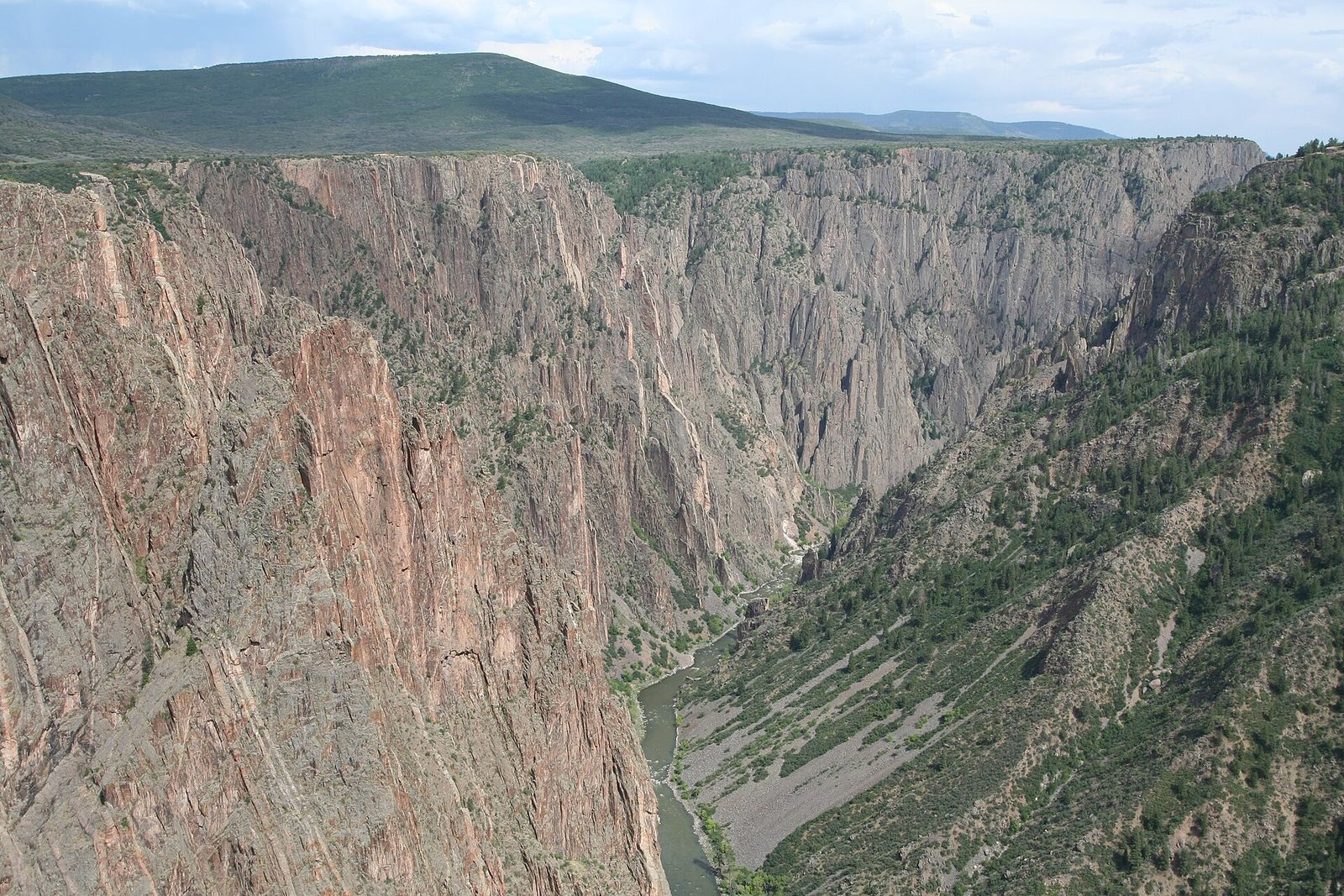 The dark, sheer walls of the Black Canyon of the Gunnison with the river far below