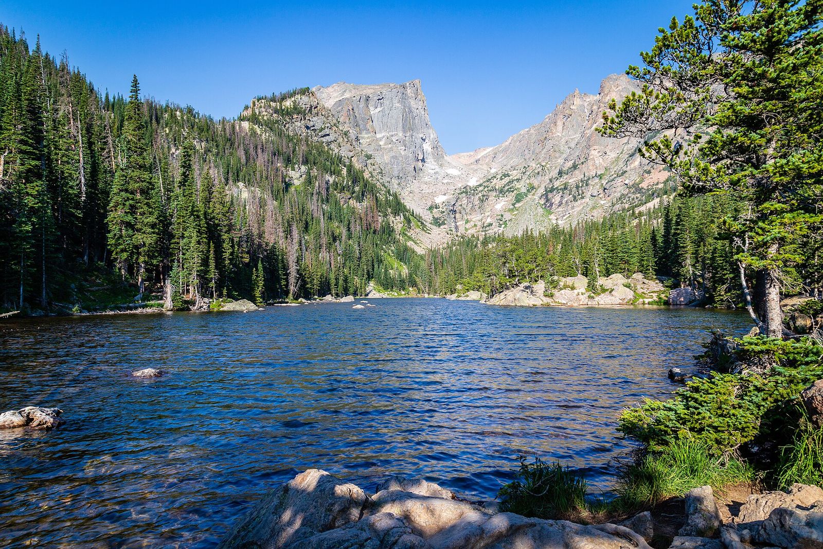 Dream Lake in Rocky Mountain National Park, with rugged peaks above the still water