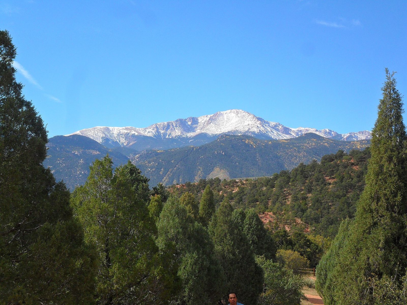 Pikes Peak rising above the forested foothills near Colorado Springs