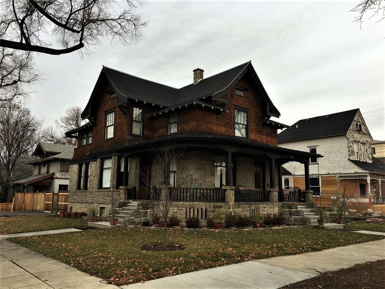 A large historic shingled house with a wide front porch in Boise's Fort Street Historic District